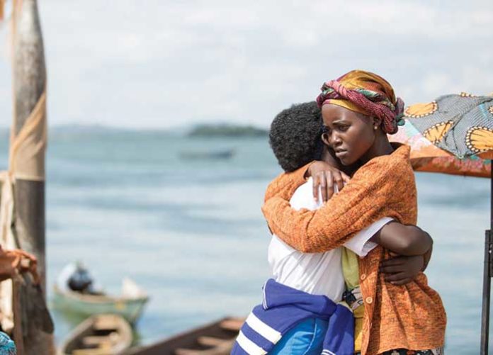 28-29_SCAF-NovDec16_FILM_Queen-of-Katwe_01_Still-from-Queen-of-Katwe-with-Oscar-winner-Lupita-Nyongo-and-Madina-Nalwanga